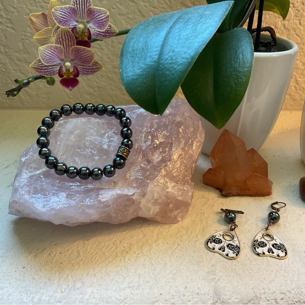 Elegant Black Beaded Bracelet and Silver Heart Earrings